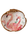 An irregularly shaped decorative tray with a gold-toned organic border and a white interior featuring a painted pink flamingo design with small green accents, shown on a plain white background.